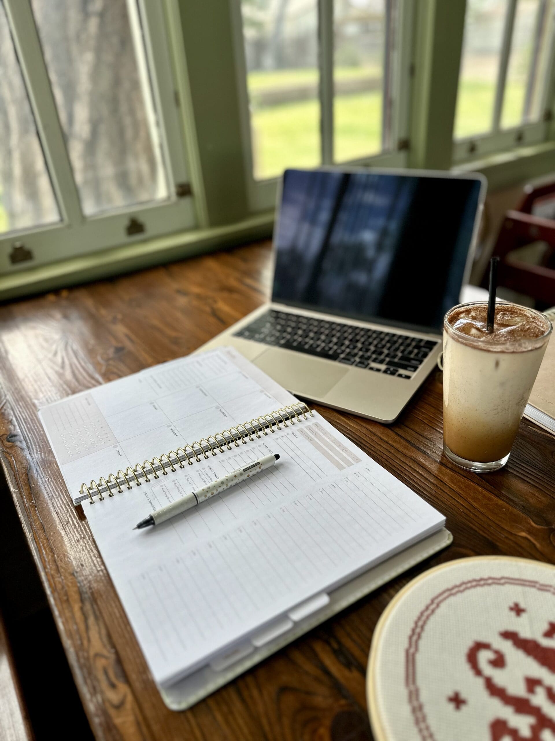 planner on a desk to map out workweek for ADHD business owner
